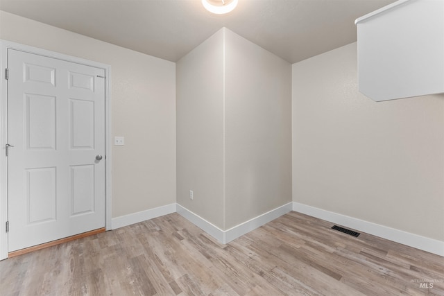 5291 N Midnight Haze Way, Meridian, ID 83646 - unfurnished room with light wood finished floors