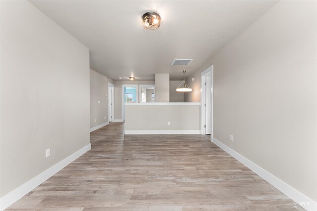5291 N Midnight Haze Way, Meridian, ID 83646 - unfurnished room with light wood finished floors and baseboards