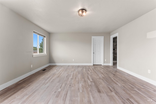 5291 N Midnight Haze Way, Meridian, ID 83646 - unfurnished room featuring light wood-style flooring and baseboards