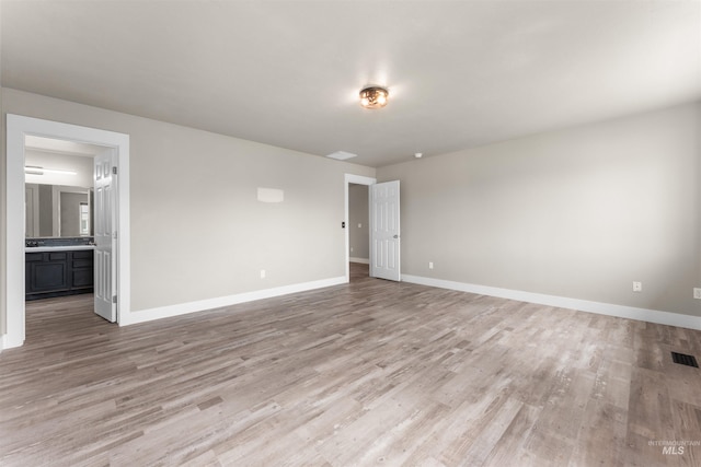 5291 N Midnight Haze Way, Meridian, ID 83646 - empty room with light wood-style flooring