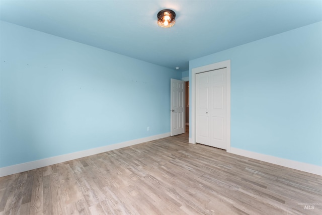 5291 N Midnight Haze Way, Meridian, ID 83646 - spare room with light wood-style flooring