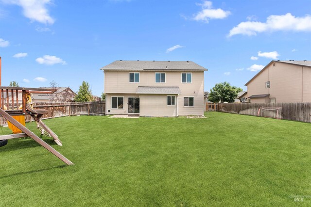 5291 N Midnight Haze Way, Meridian, ID 83646 - back of property with a fenced backyard