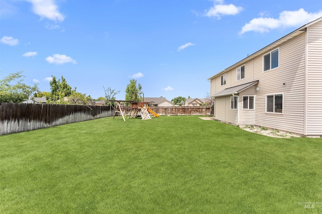 5291 N Midnight Haze Way, Meridian, ID 83646 - fenced backyard with a playground