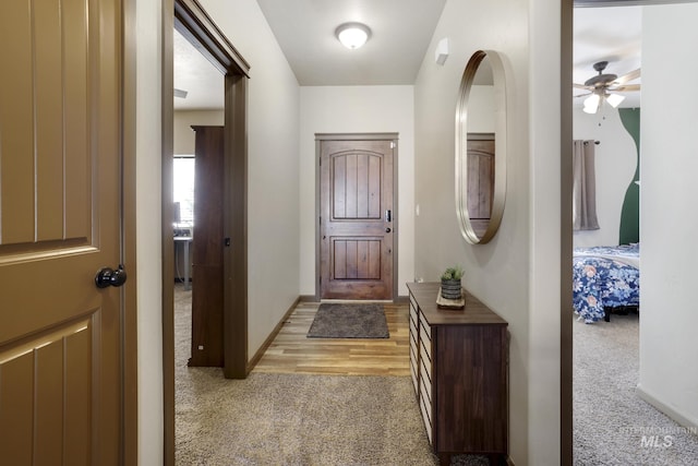 812 Kelli Ln, Filer, ID 83328 - foyer with ceiling fan, light carpet, and baseboards
