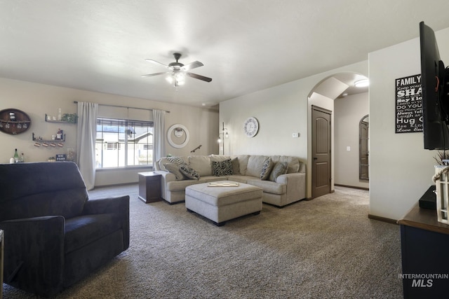 812 Kelli Ln, Filer, ID 83328 - carpeted living area with ceiling fan and arched walkways