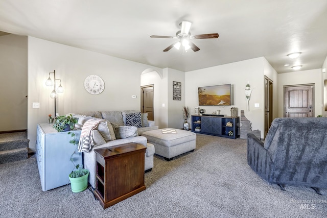 812 Kelli Ln, Filer, ID 83328 - living area featuring arched walkways, ceiling fan, and carpet floors