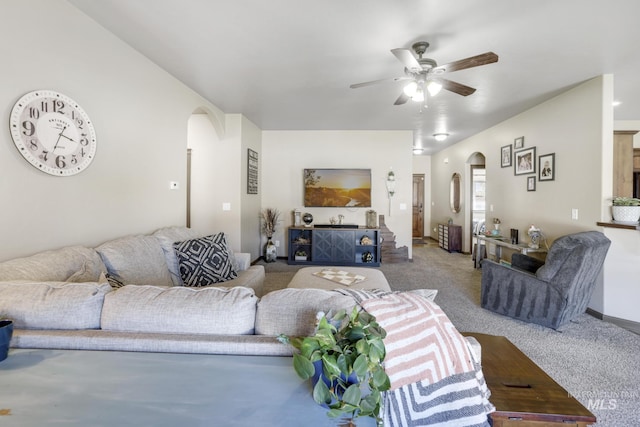 812 Kelli Ln, Filer, ID 83328 - carpeted living room featuring arched walkways and a ceiling fan