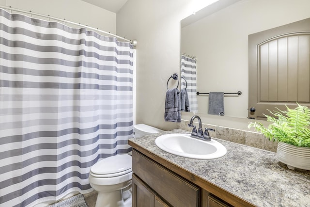 812 Kelli Ln, Filer, ID 83328 - bathroom with toilet, vanity, and a shower with curtain