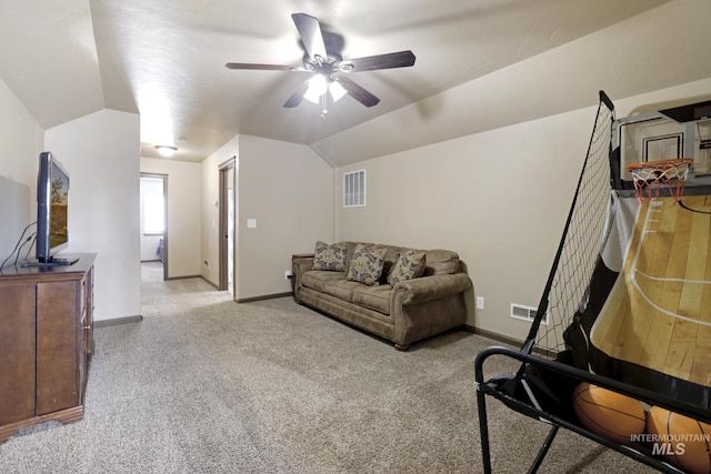 812 Kelli Ln, Filer, ID 83328 - carpeted living area with visible vents, baseboards, a ceiling fan, and vaulted ceiling