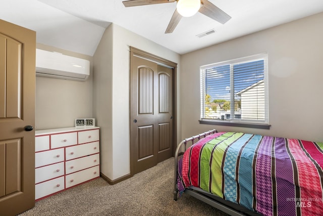812 Kelli Ln, Filer, ID 83328 - carpeted bedroom featuring visible vents, ceiling fan, a closet, and a wall mounted air conditioner