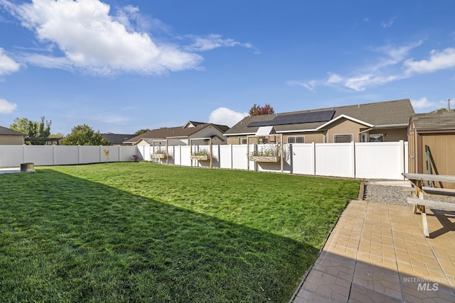812 Kelli Ln, Filer, ID 83328 - view of yard featuring a patio, a fenced backyard, and a residential view