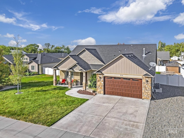 812 Kelli Ln, Filer, ID 83328 - craftsman-style house featuring driveway, board and batten siding, a front lawn, an attached garage, and fence