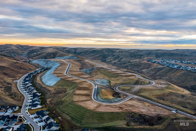 aerial view at dusk with a mountain view