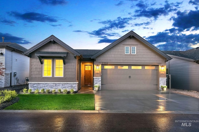 2477 E Galleon Ln, Meridian, ID 83642 - craftsman house with stone siding, concrete driveway, a front lawn, and an attached garage