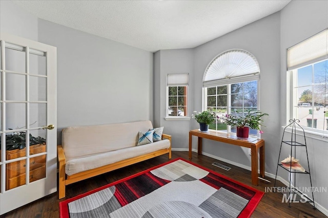 2668 N Morello, Meridian, ID 83646 - sitting room with wood finished floors, baseboards, and visible vents