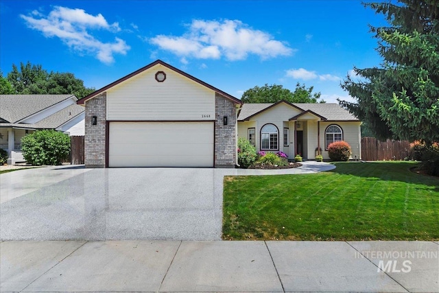 2668 N Morello, Meridian, ID 83646 - ranch-style home featuring a front yard, a garage, fence, concrete driveway, and brick siding