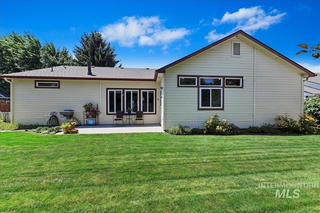 2668 N Morello, Meridian, ID 83646 - back of property with a patio and a yard
