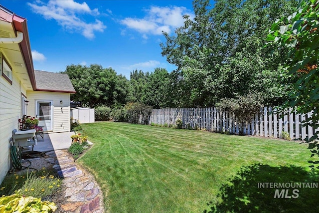 2668 N Morello, Meridian, ID 83646 - view of yard featuring a shed, a patio, an outdoor structure, and fence