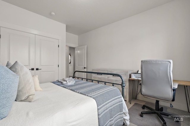 205 S Sunniva Ave, Kuna, ID 83634 - carpeted bedroom with a closet and an office area