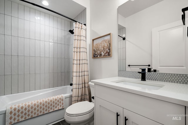 205 S Sunniva Ave, Kuna, ID 83634 - full bath featuring vanity, shower / bath combination with curtain, toilet, and tasteful backsplash