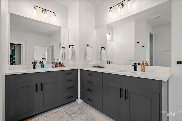 205 S Sunniva Ave, Kuna, ID 83634 - bathroom featuring double vanity and tile patterned floors