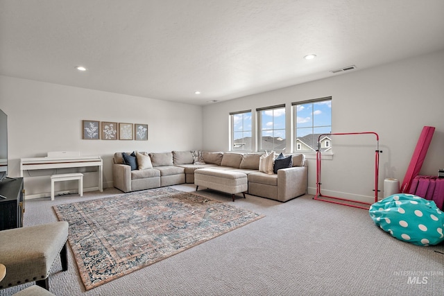 205 S Sunniva Ave, Kuna, ID 83634 - carpeted living room featuring recessed lighting and baseboards