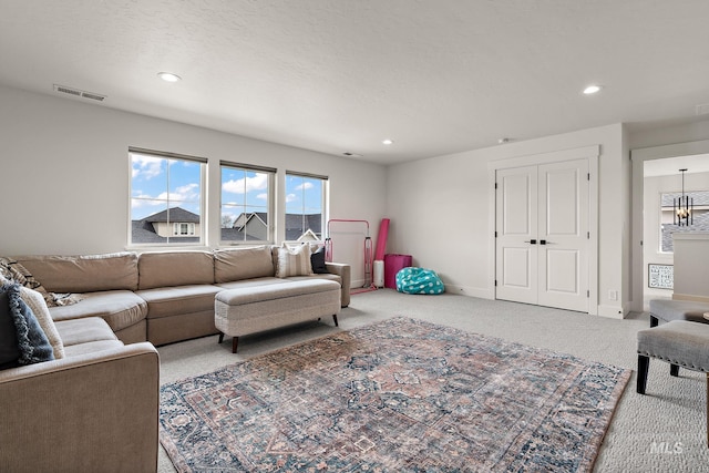205 S Sunniva Ave, Kuna, ID 83634 - living area with carpet flooring, recessed lighting, and baseboards