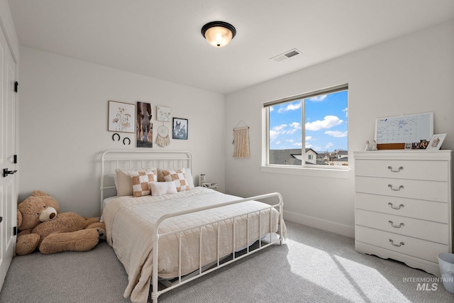 205 S Sunniva Ave, Kuna, ID 83634 - bedroom featuring light carpet and baseboards