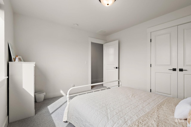 205 S Sunniva Ave, Kuna, ID 83634 - bedroom with carpet, a closet, and baseboards