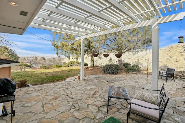 view of patio featuring a pergola and grilling area