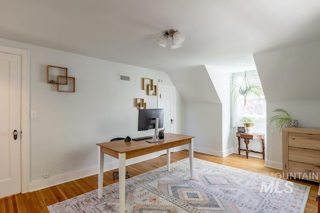 517 E C St, Moscow, ID 83843 - office featuring light wood finished floors, lofted ceiling, and baseboards