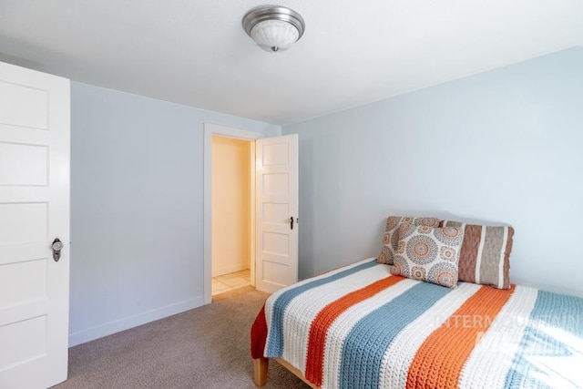 517 E C St, Moscow, ID 83843 - bedroom featuring carpet flooring and baseboards