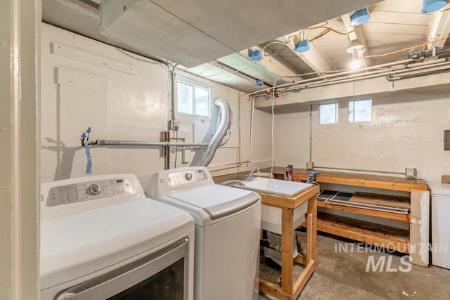 517 E C St, Moscow, ID 83843 - clothes washing area featuring separate washer and dryer