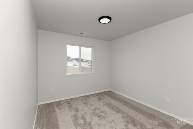 5754 W Stavros St, Meridian, ID 83646 - empty room featuring carpet flooring and baseboards