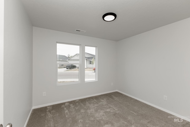 5754 W Stavros St, Meridian, ID 83646 - unfurnished room featuring carpet floors and baseboards