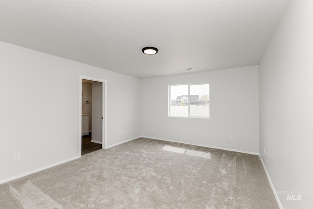5754 W Stavros St, Meridian, ID 83646 - spare room featuring carpet floors and baseboards