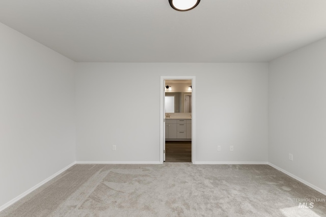 5754 W Stavros St, Meridian, ID 83646 - unfurnished bedroom featuring carpet floors, baseboards, and ensuite bathroom