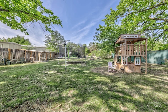 1035 N 7th Ave N, Payette, ID 83661 - view of yard featuring a trampoline and a playground