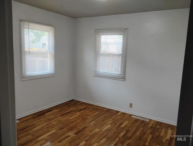 1035 N 7th Ave N, Payette, ID 83661 - spare room with healthy amount of natural light and wood finished floors