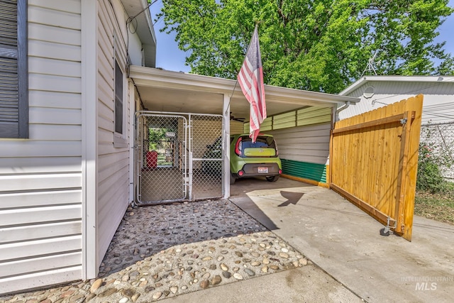 1035 N 7th Ave N, Payette, ID 83661 - view of patio / terrace featuring an attached carport and driveway