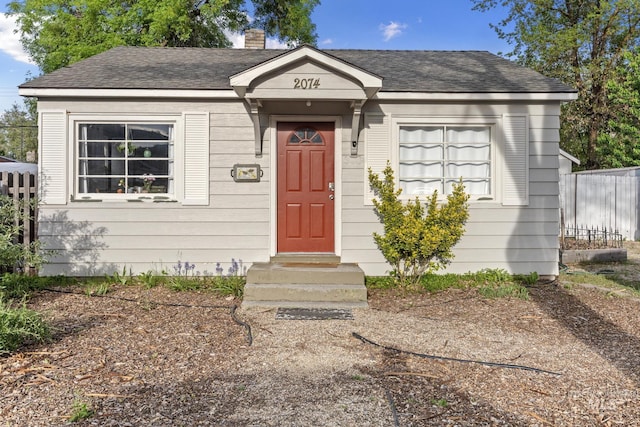 2074 S Broxon St, Boise, ID 83705 - view of front of home with a chimney and roof with shingles