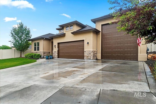 view of front of house with a garage