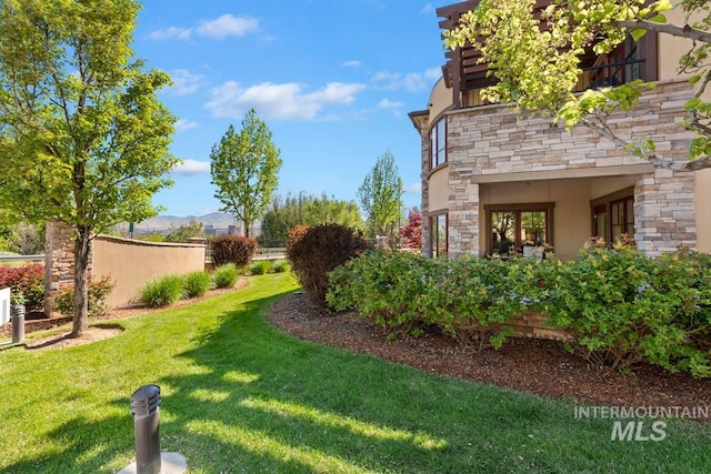 view of yard featuring fence