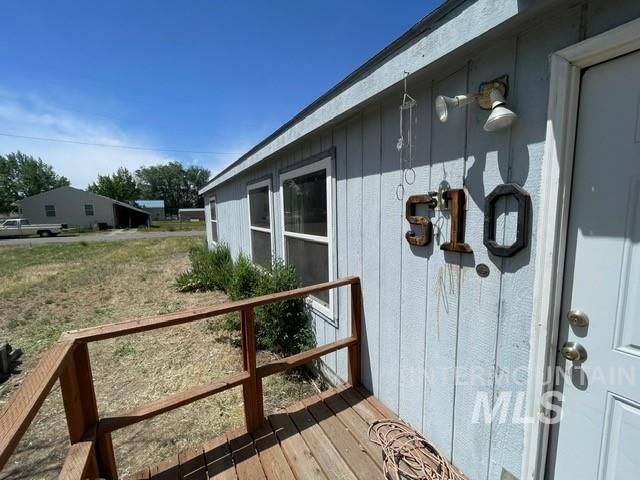 510 E Arthur Ave, Glenns Ferry, ID 83623 - property entrance with a wooden deck