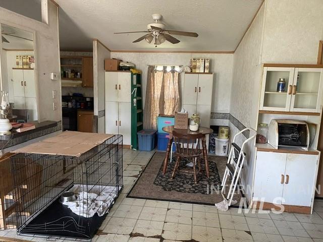510 E Arthur Ave, Glenns Ferry, ID 83623 - kitchen featuring a ceiling fan and a textured ceiling
