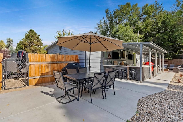 view of patio featuring a bar