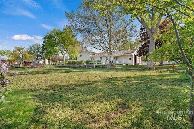 view of yard with fence
