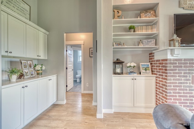 kitchen with light hardwood / wood-style floors