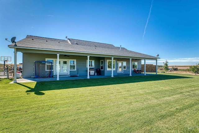 27652 Hop Rd, Caldwell, ID 83607 - back of property with a ceiling fan, a patio area, and a yard