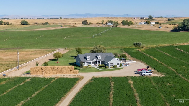 bird's eye view featuring a mountain view and a rural view